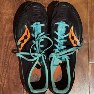 Women's Saucony LIKE NEW track shoes with spikes, size 10.